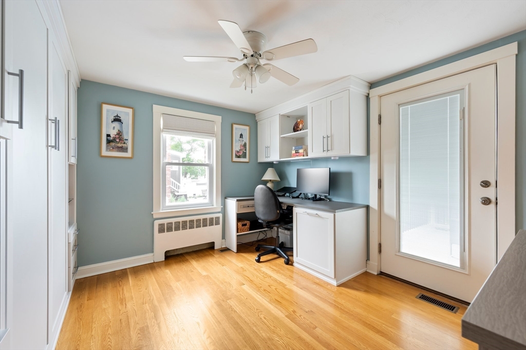 22 E Street Hull, MA 02045 - Photo 10 of 20 a workspace with wooden floor and a window