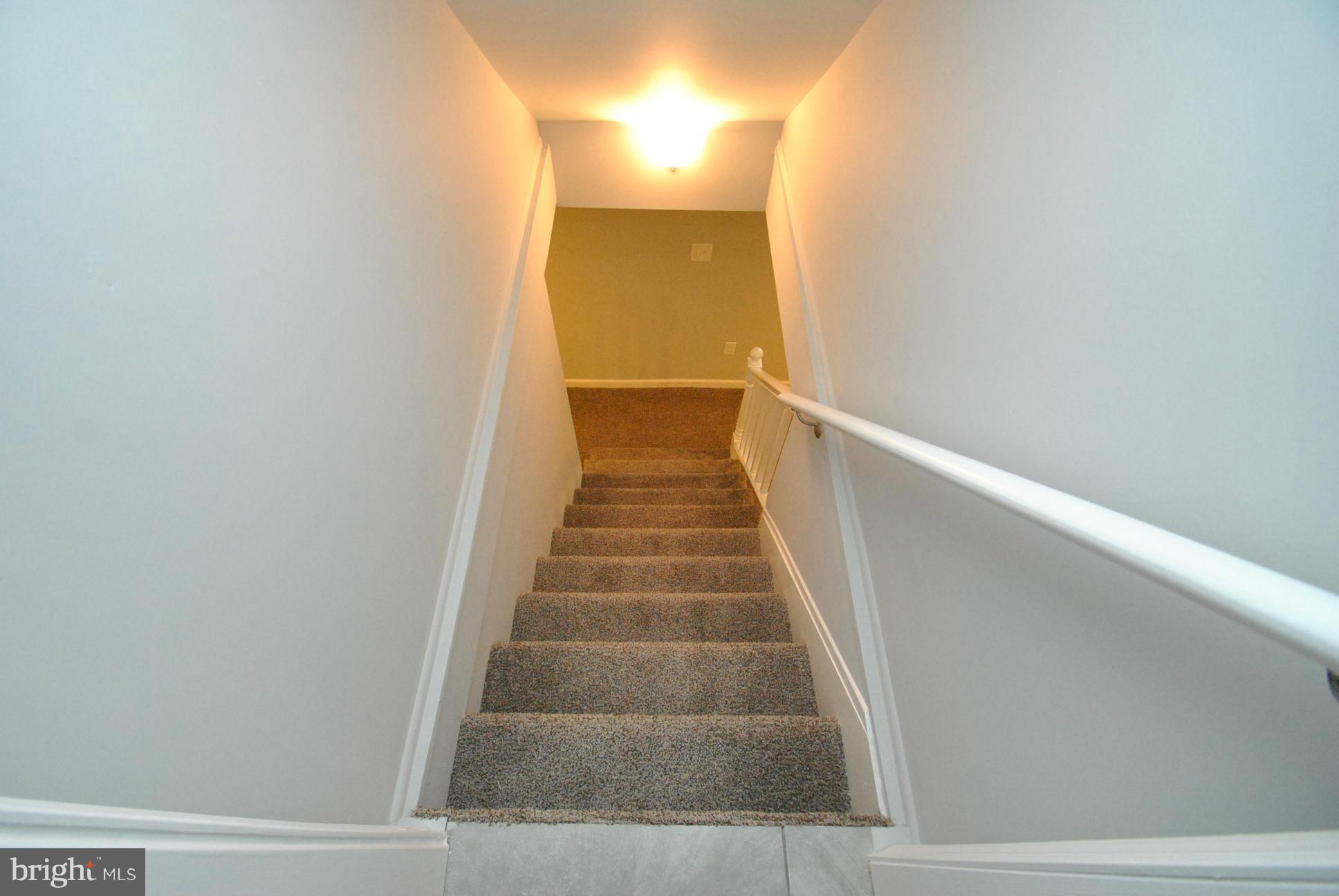 8626 Oakleigh Road Baltimore, MD 21234 - Photo 18 of 30 STAIRS TO FINISHED LOWER LEVEL