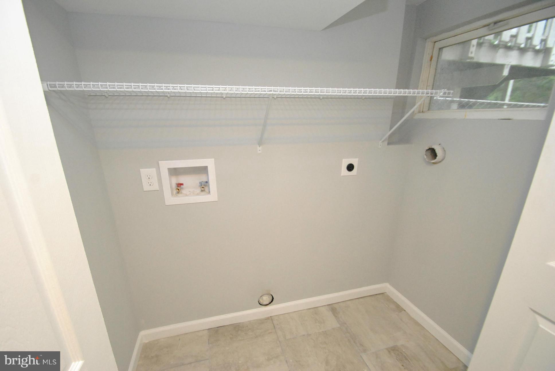 8626 Oakleigh Road Baltimore, MD 21234 - Photo 23 of 30 FINISHED LAUNDRY ROOM W/HOOK UPS