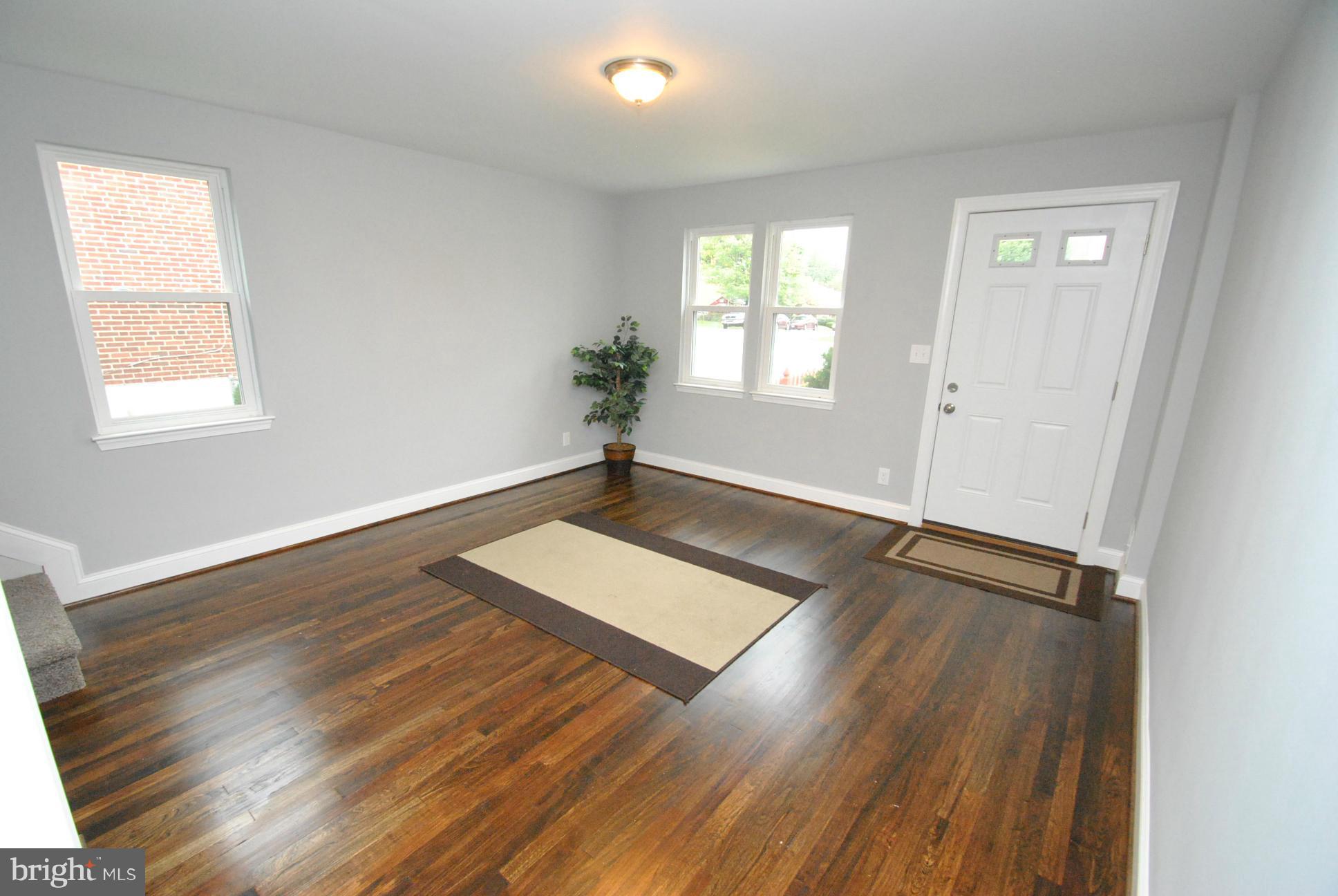 8626 Oakleigh Road Baltimore, MD 21234 - Photo 5 of 30 GLEAMING HARDWOOD FLOORS
