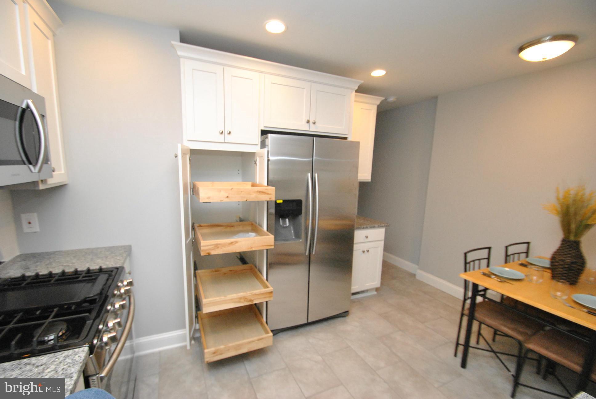 8626 Oakleigh Road Baltimore, MD 21234 - Photo 10 of 30 DESIGNER GRANITE KITCHN W/SS APPS & CUSTOM CABINTS