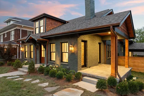 a view of a house with wooden walls
