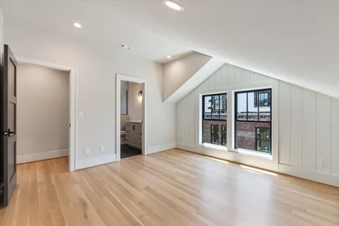 a bathroom with a toilet sink and shower
