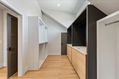 a view of a house with backyard and porch