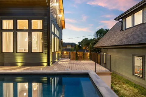 a view of a swimming pool with a lounge chairs
