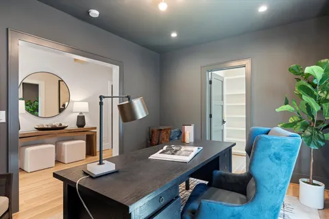 a bedroom with bed and a window