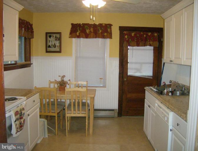 29 Clem Drive Ranson, WV 25438 - Photo 3 of 3 a view of a dining room with furniture and window