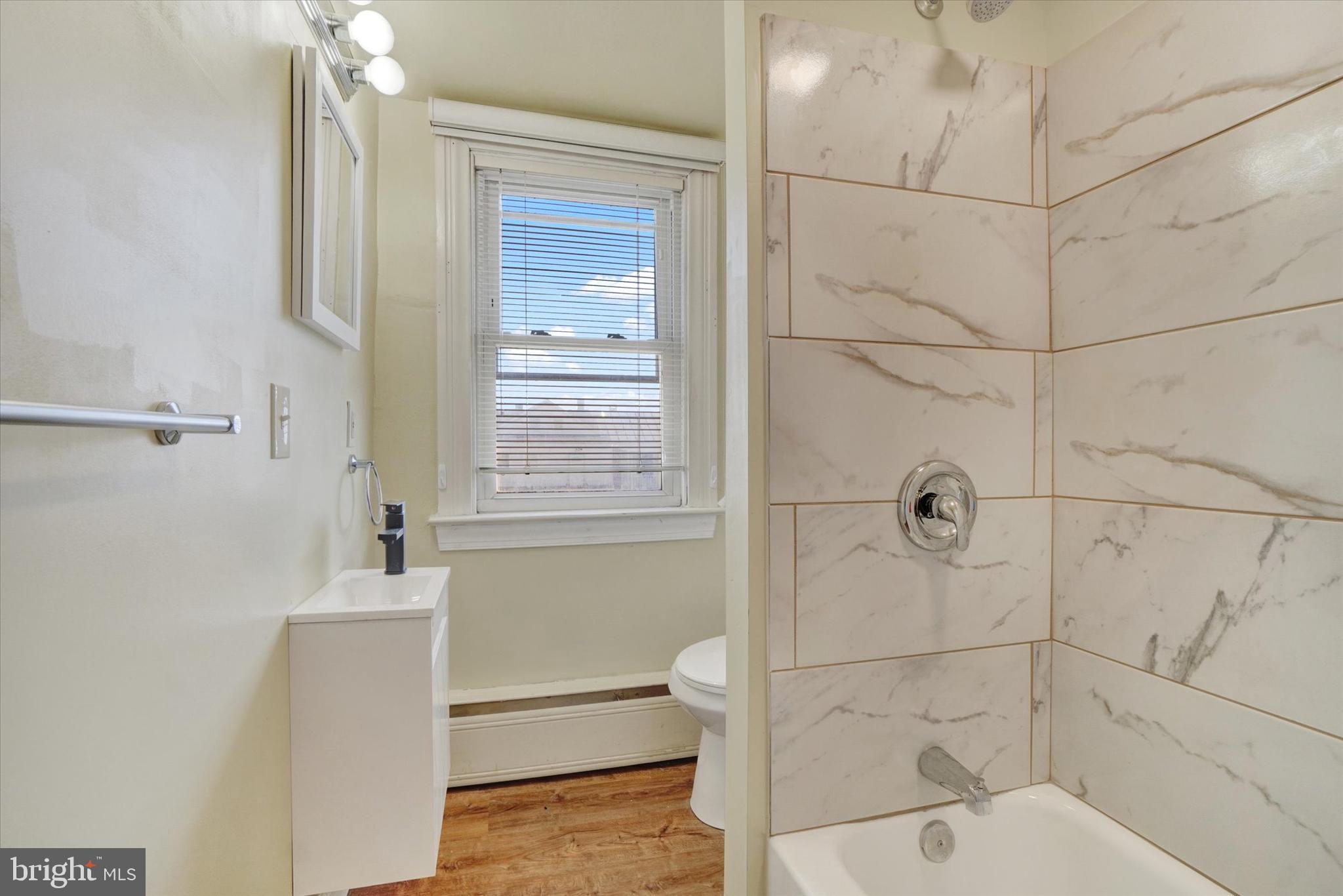 58 East Railroad Street Spring Grove, PA 17362 - Photo 17 of 24 a bathroom with a shower and a toilet