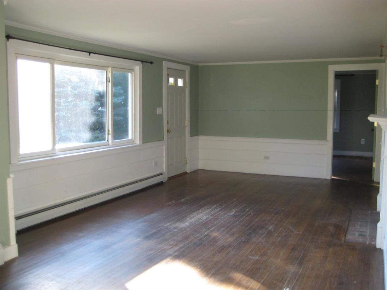30 Fisher Road Hyannis, MA 02601 - Photo 5 of 8 an empty room with wooden floor and windows