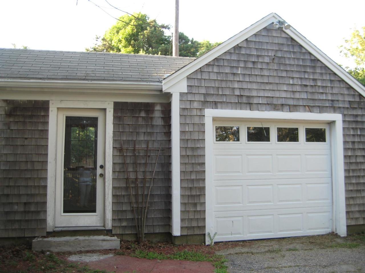 30 Fisher Road Hyannis, MA 02601 - Photo 8 of 8 a front view of a house with a garden