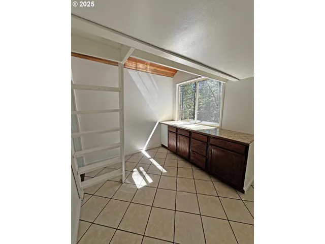 a view of a room with windows