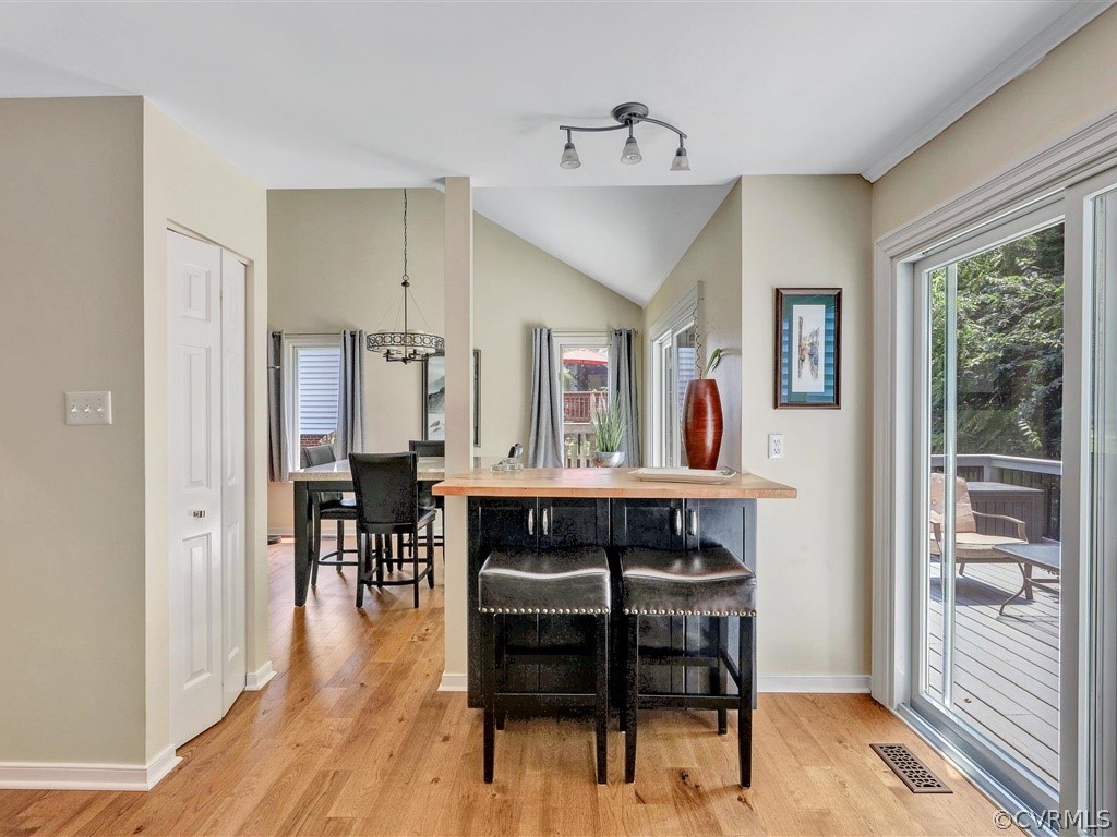 13804 Sandy Oak Road Chester, VA 23831 - Photo 15 of 31 a view of a room with furniture and wooden floor