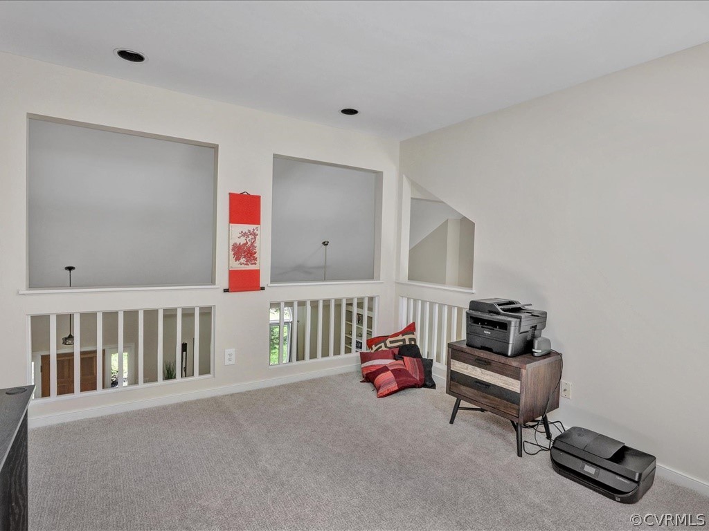13804 Sandy Oak Road Chester, VA 23831 - Photo 23 of 31 a bedroom with furniture and a rug