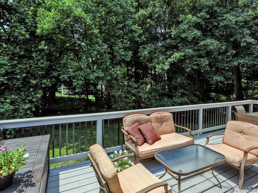 13804 Sandy Oak Road Chester, VA 23831 - Photo 29 of 31 a deck view with a seating space
