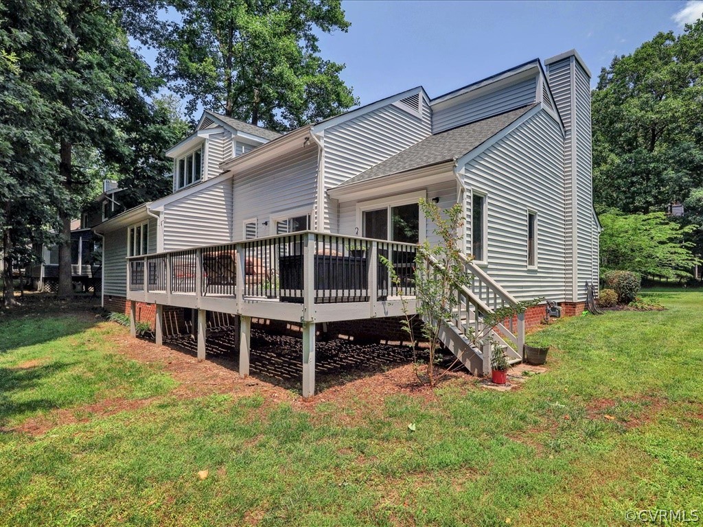 13804 Sandy Oak Road Chester, VA 23831 - Photo 31 of 31 a view of a house with a yard