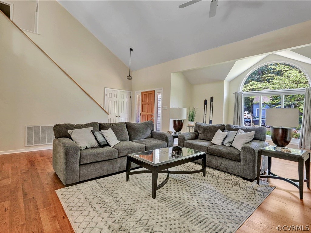 13804 Sandy Oak Road Chester, VA 23831 - Photo 8 of 31 a living room with furniture and a large window