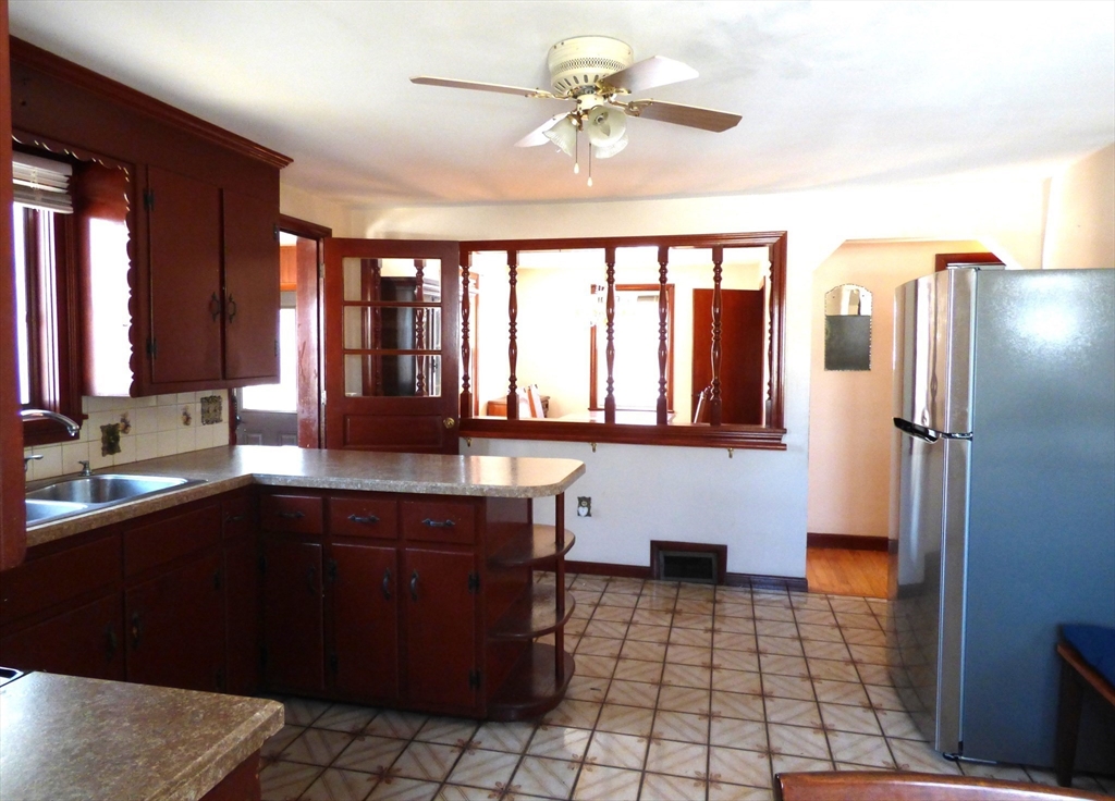 259 Prospect Street Ludlow, MA 01056 - Photo 12 of 30 a kitchen with a sink cabinets and appliances