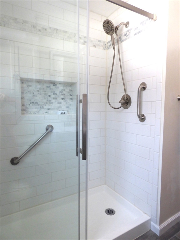 259 Prospect Street Ludlow, MA 01056 - Photo 15 of 30 a bath tub sitting next to a shower