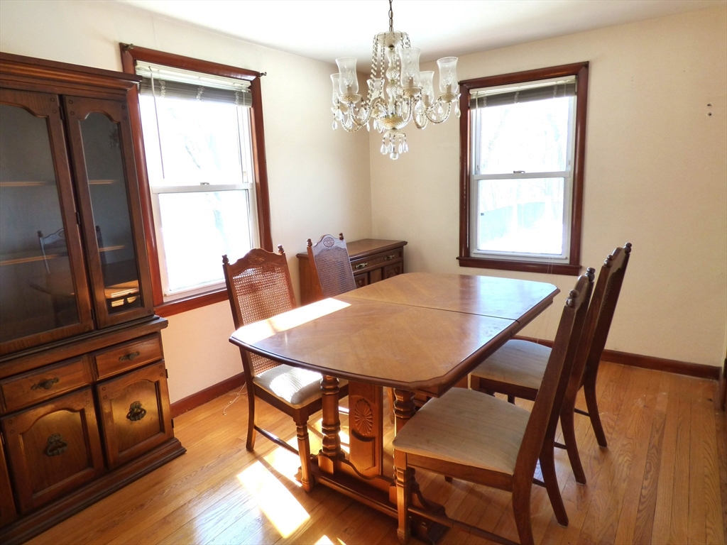 259 Prospect Street Ludlow, MA 01056 - Photo 16 of 30 a view of a dining room with furniture window and wooden floor