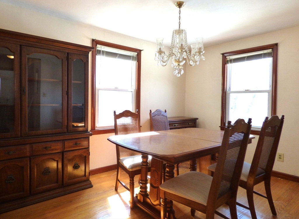 259 Prospect Street Ludlow, MA 01056 - Photo 17 of 30 a view of a dining room with furniture window and wooden floor