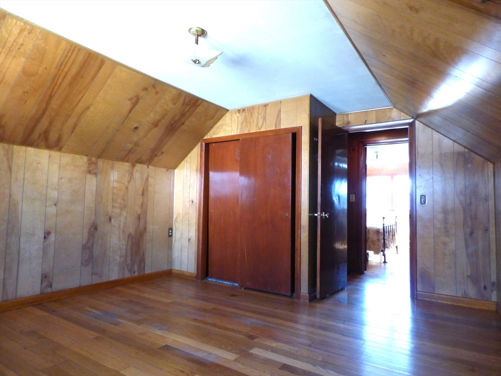 259 Prospect Street Ludlow, MA 01056 - Photo 23 of 30 a view of an empty room with wooden floor