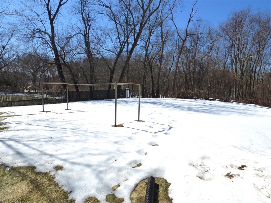 259 Prospect Street Ludlow, MA 01056 - Photo 28 of 30 a street view covered with snow