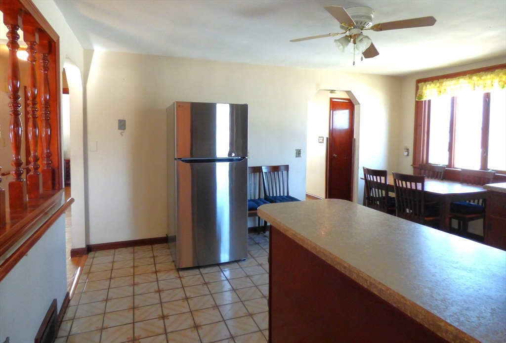 259 Prospect Street Ludlow, MA 01056 - Photo 10 of 30 a kitchen with a refrigerator and a sink
