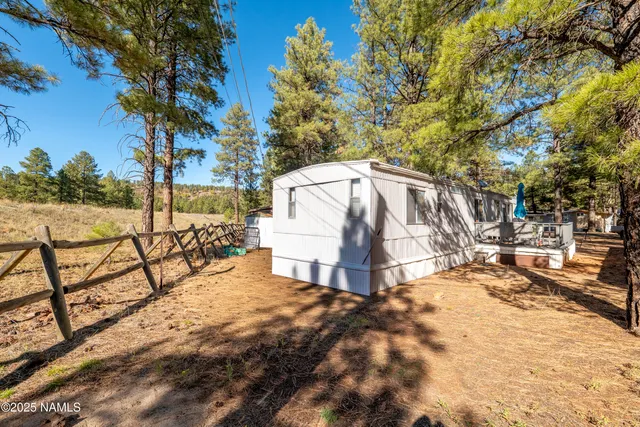 a view of a yard with sitting area