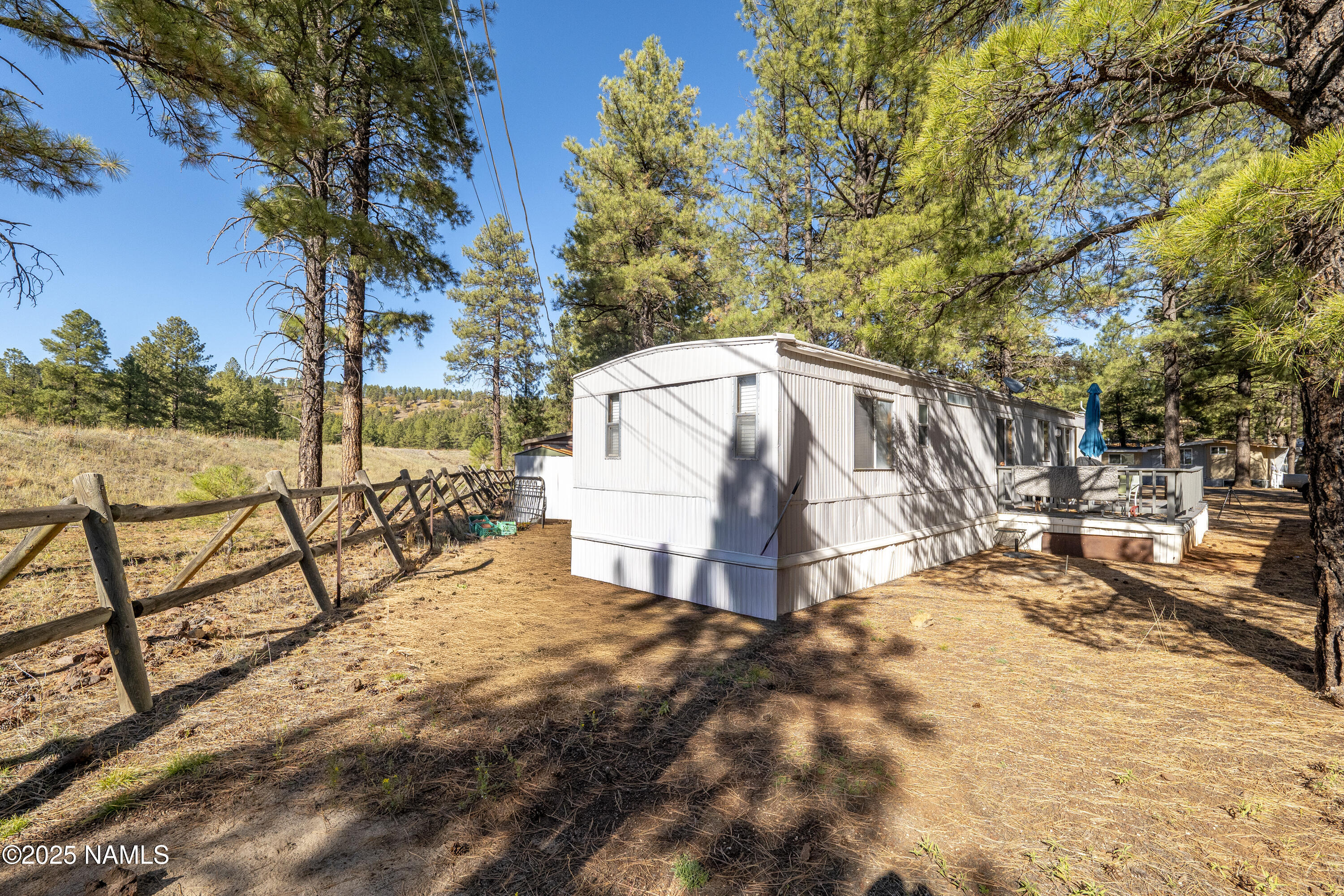 2500 West Rte 66, Unit 83 Flagstaff, AZ 86001 - Photo 18 of 24 a view of a yard with sitting area
