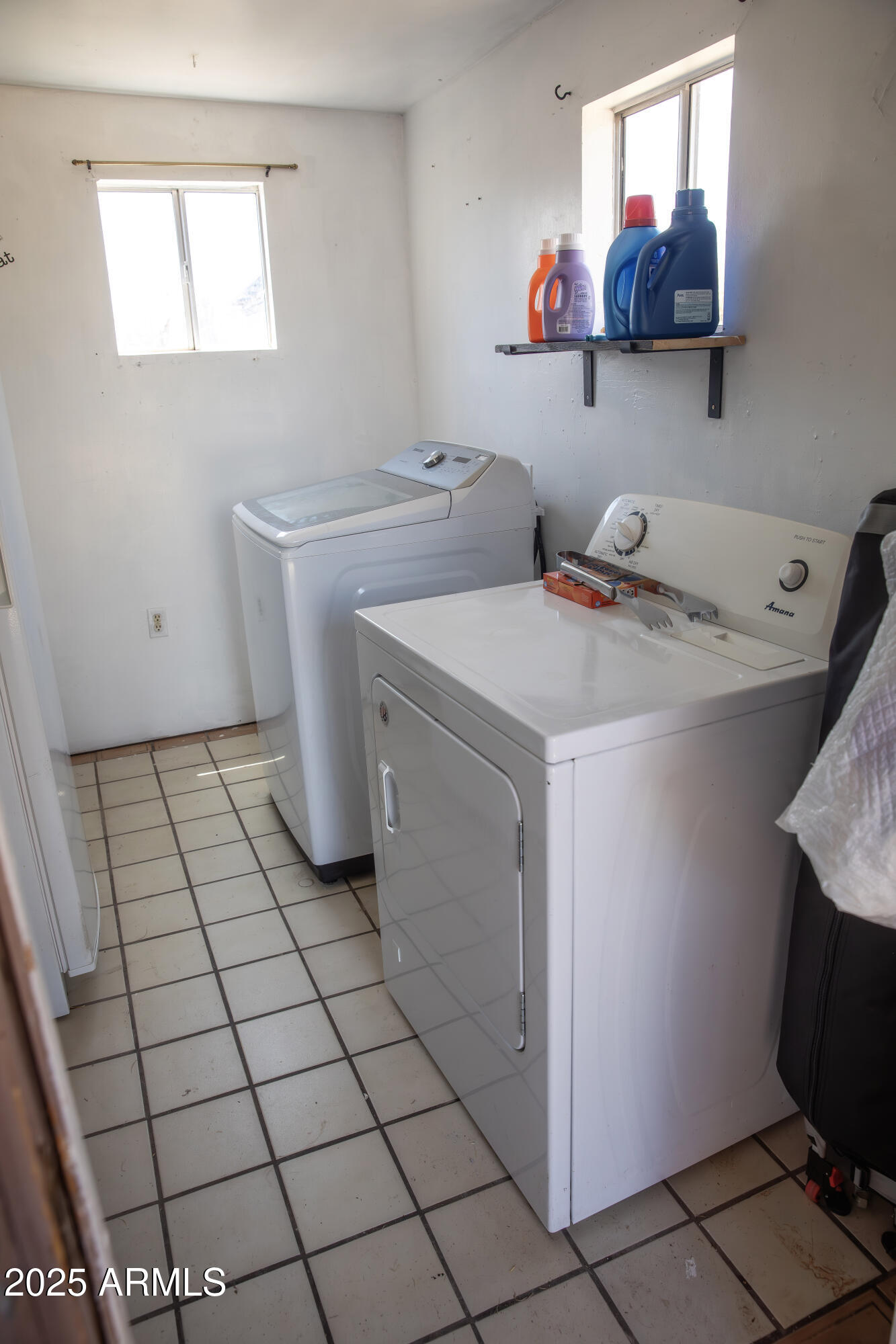 108 Graham Drive Bisbee, AZ 85603 - Photo 19 of 52 a utility room with a washing machine