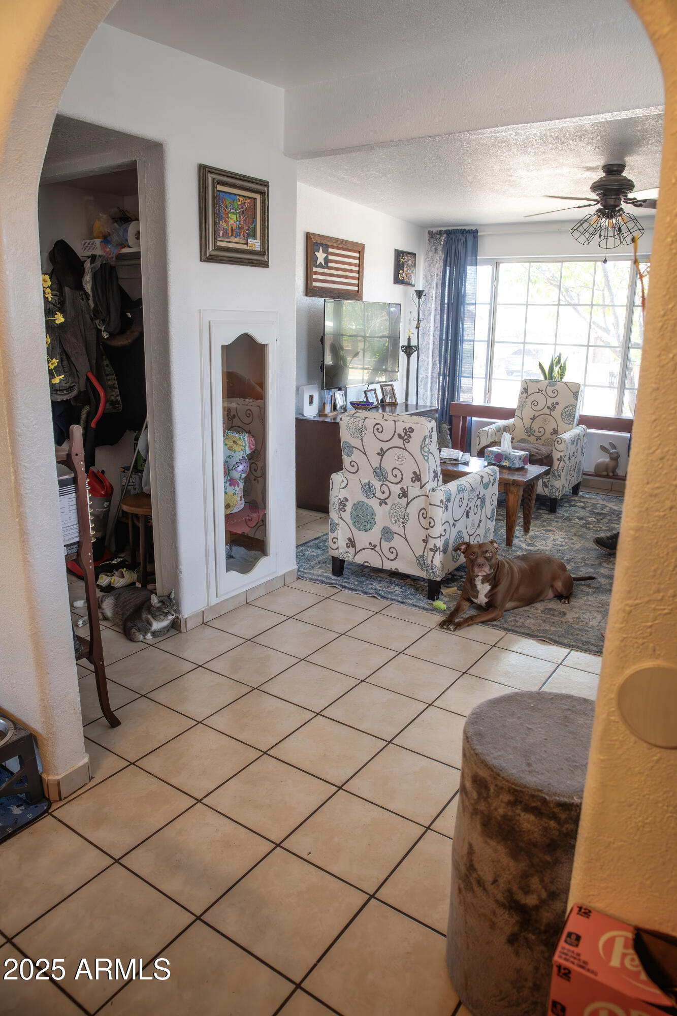 108 Graham Drive Bisbee, AZ 85603 - Photo 24 of 52 a living room with furniture and a fireplace