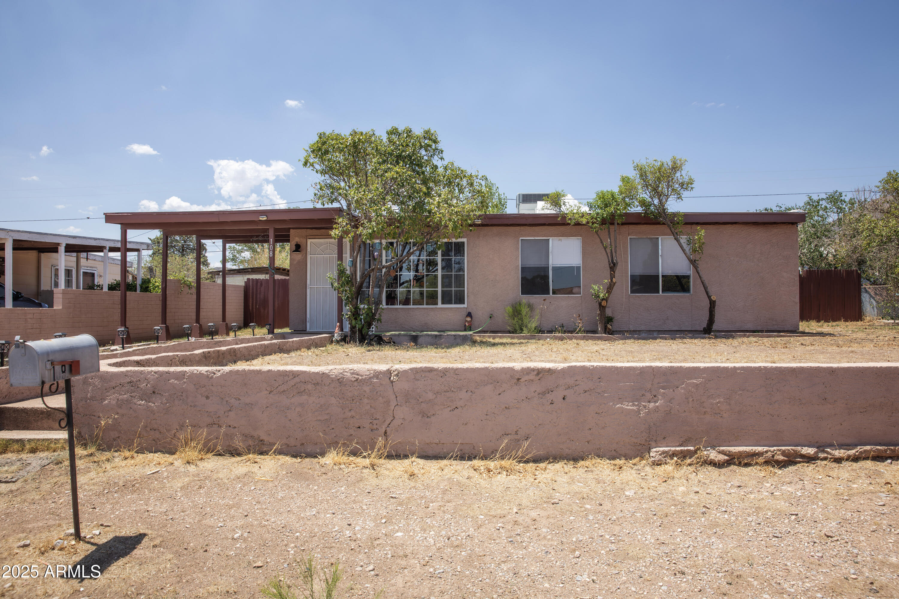 108 Graham Drive Bisbee, AZ 85603 - Photo 3 of 52 a front view of a house