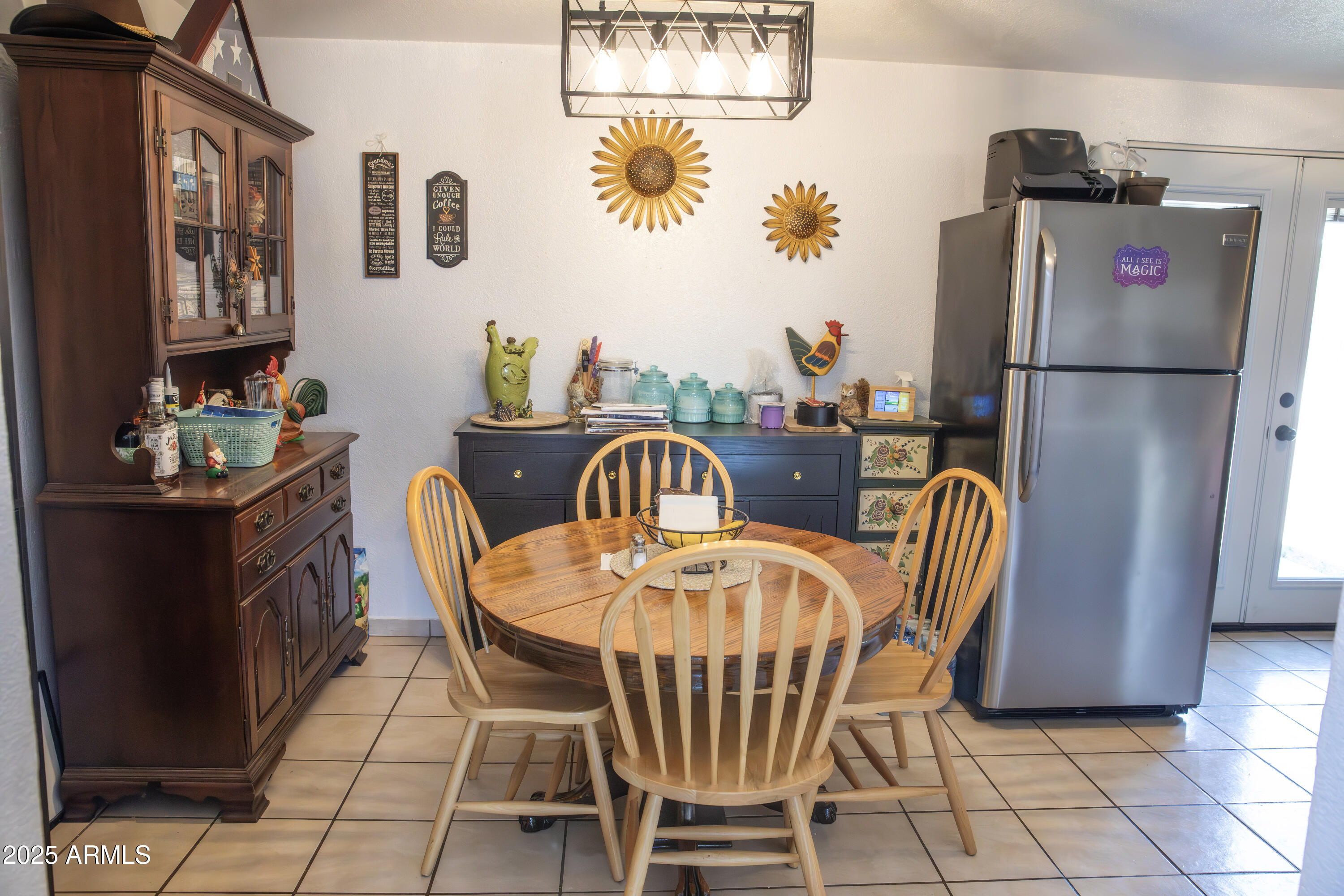 108 Graham Drive Bisbee, AZ 85603 - Photo 31 of 52 a dining room with furniture a livingroom and chandelier