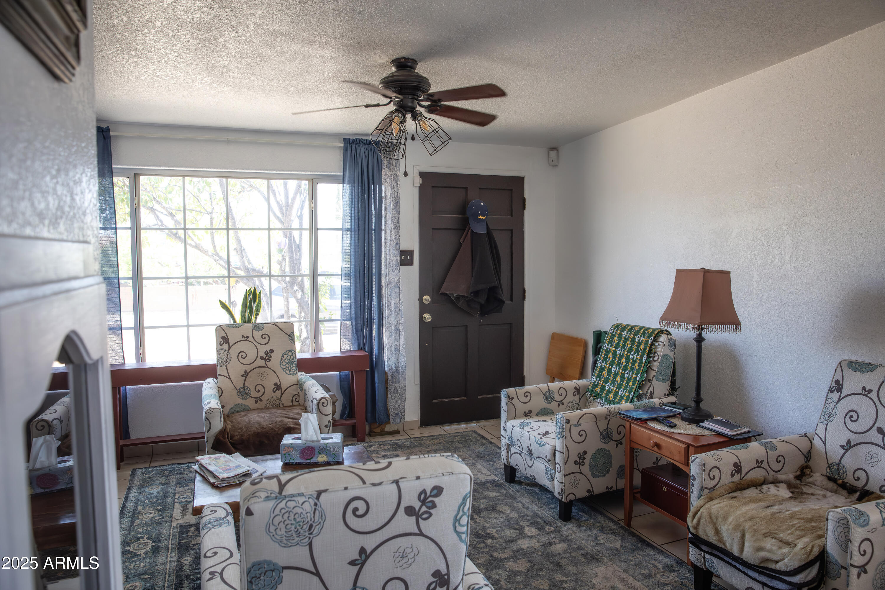 108 Graham Drive Bisbee, AZ 85603 - Photo 34 of 52 a living room with furniture and a window