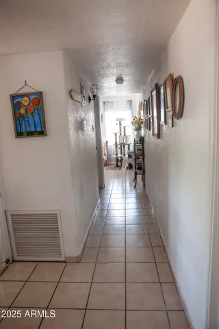 a view of bedroom with furniture and window