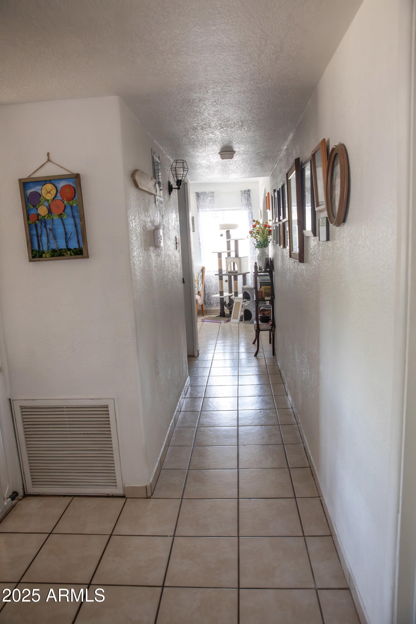 108 Graham Drive Bisbee, AZ 85603 - Photo 35 of 52 a view of a hallway with a couch