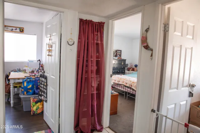 a bathroom with a sink mirror and vanity