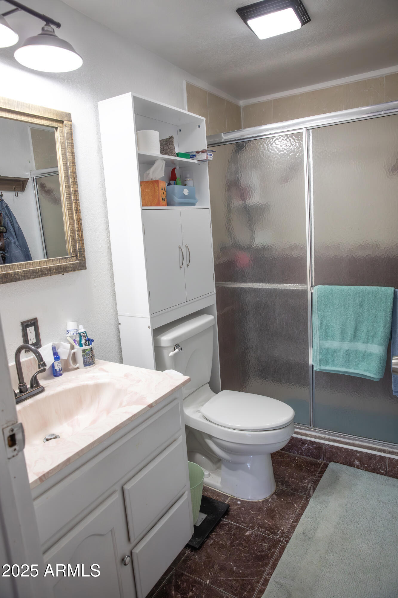 108 Graham Drive Bisbee, AZ 85603 - Photo 39 of 52 a bathroom with a sink toilet and shower