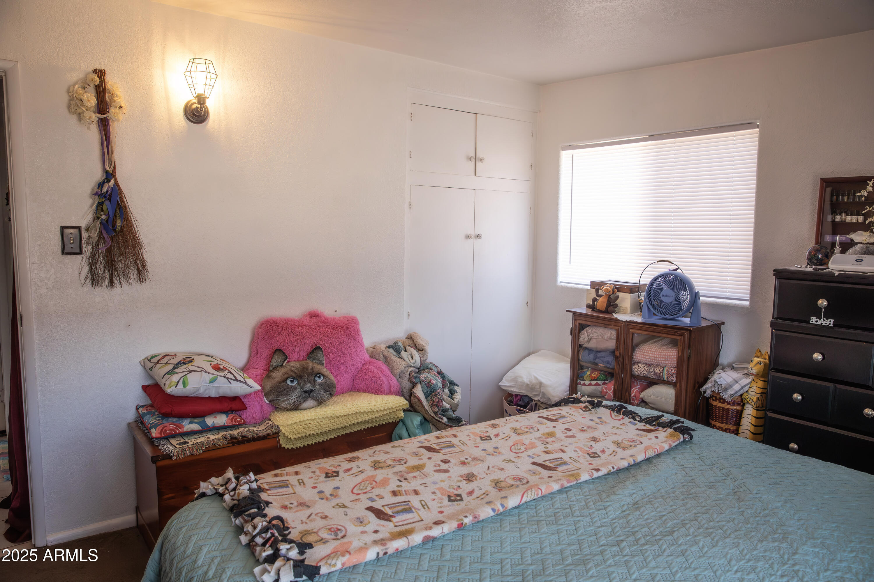 108 Graham Drive Bisbee, AZ 85603 - Photo 41 of 52 a bedroom with a bed and a window