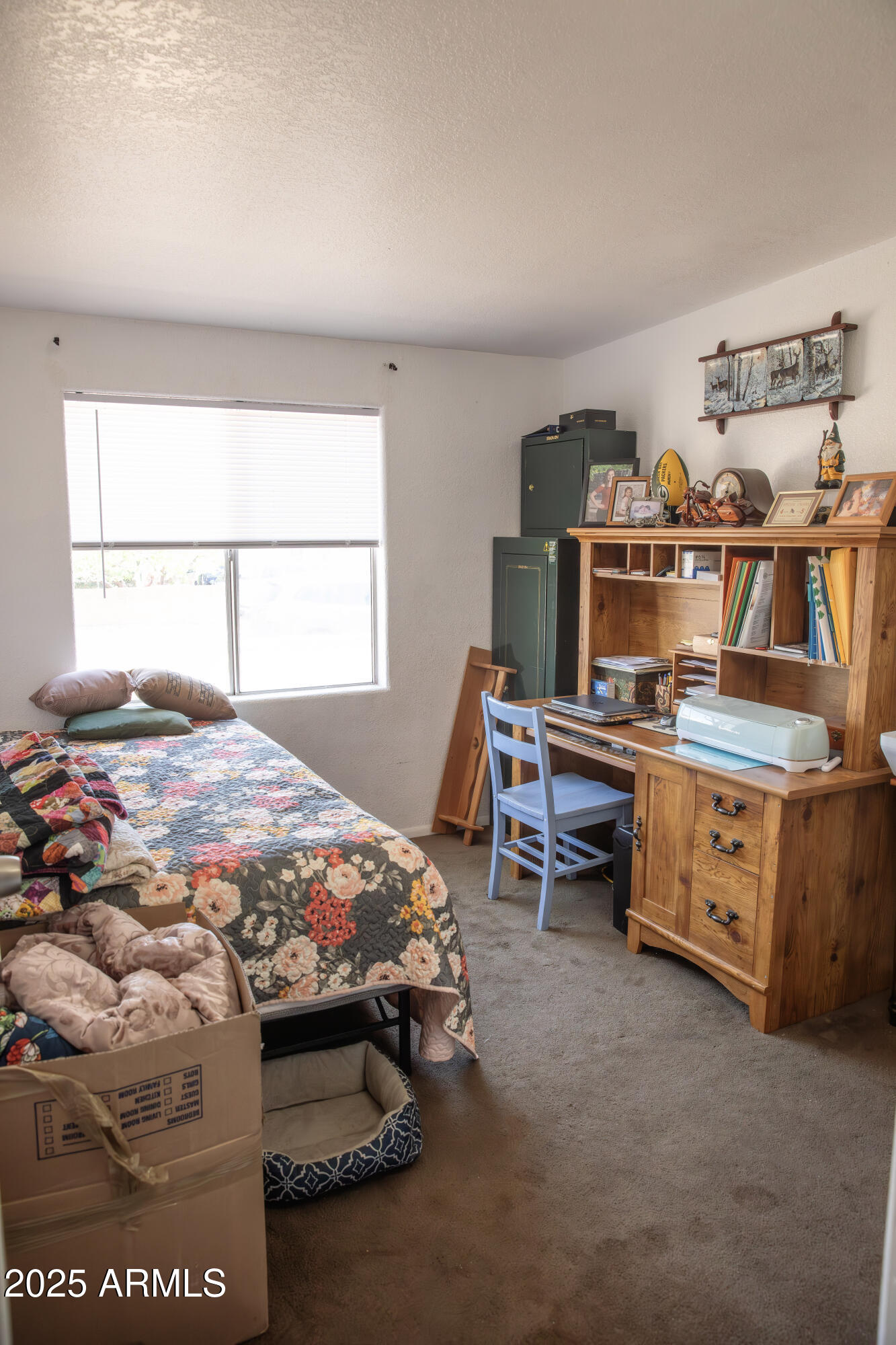 108 Graham Drive Bisbee, AZ 85603 - Photo 43 of 52 a bedroom with a bed and a window