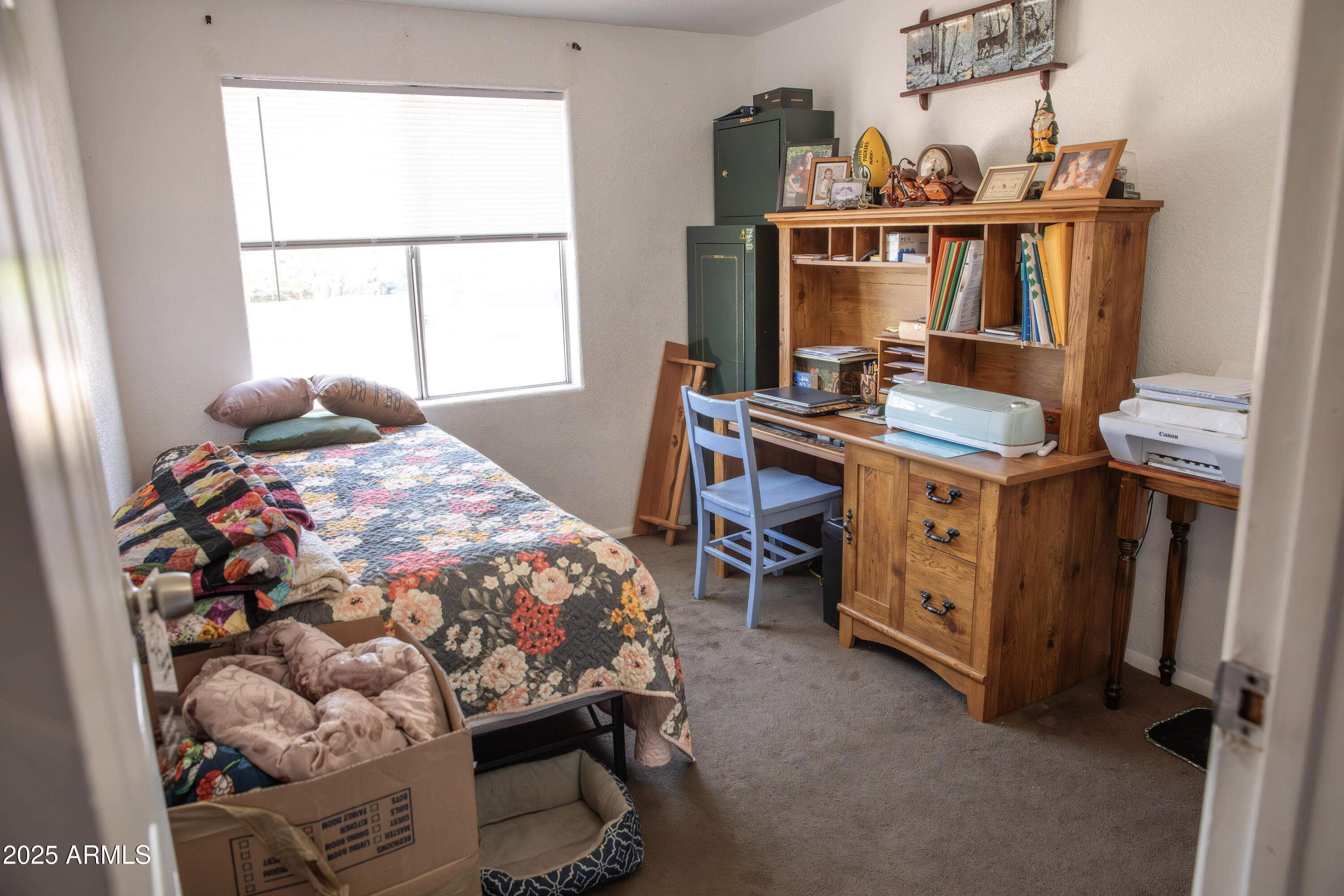 108 Graham Drive Bisbee, AZ 85603 - Photo 44 of 52 a bedroom with a bed and a window