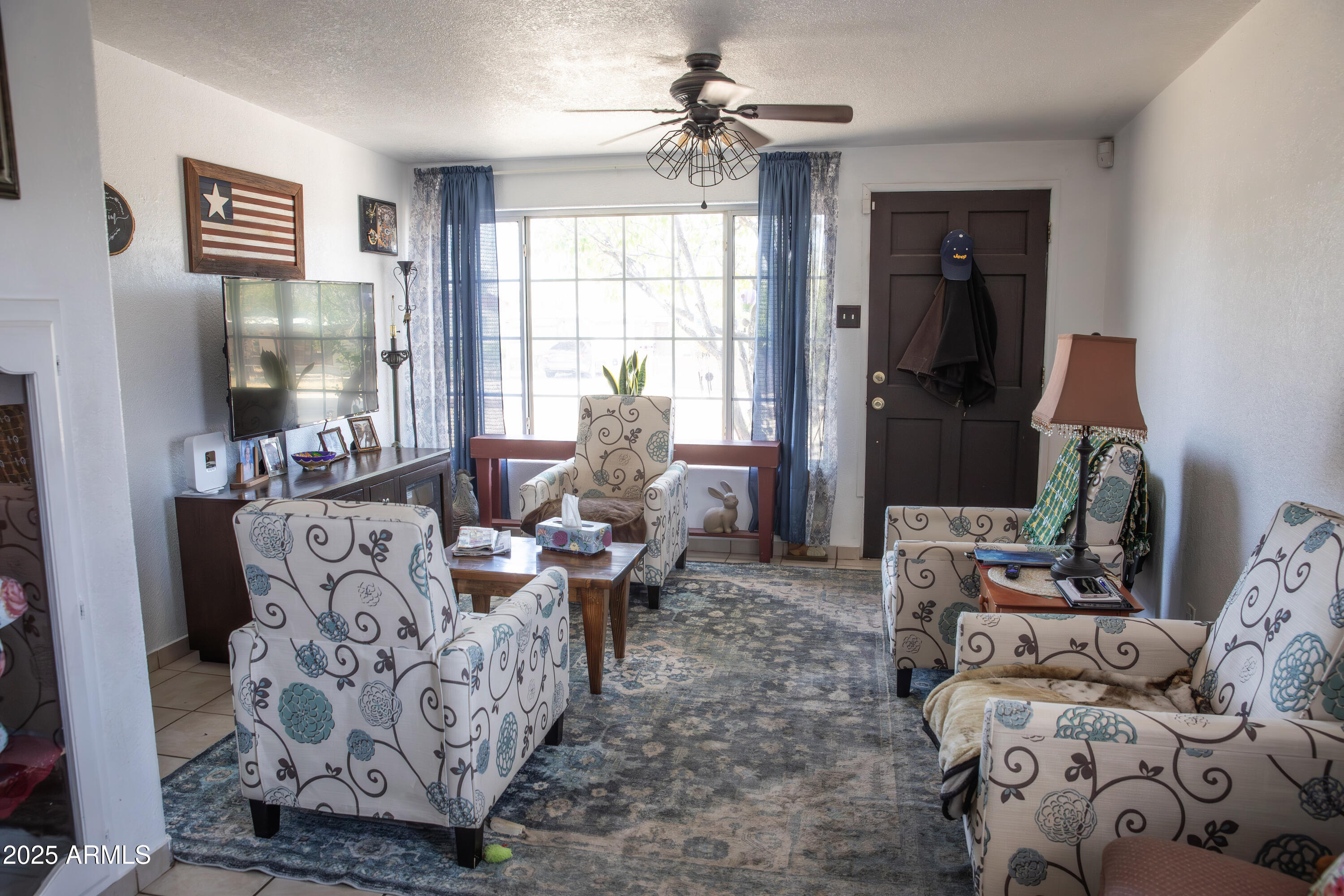 108 Graham Drive Bisbee, AZ 85603 - Photo 50 of 52 a living room with furniture and a window
