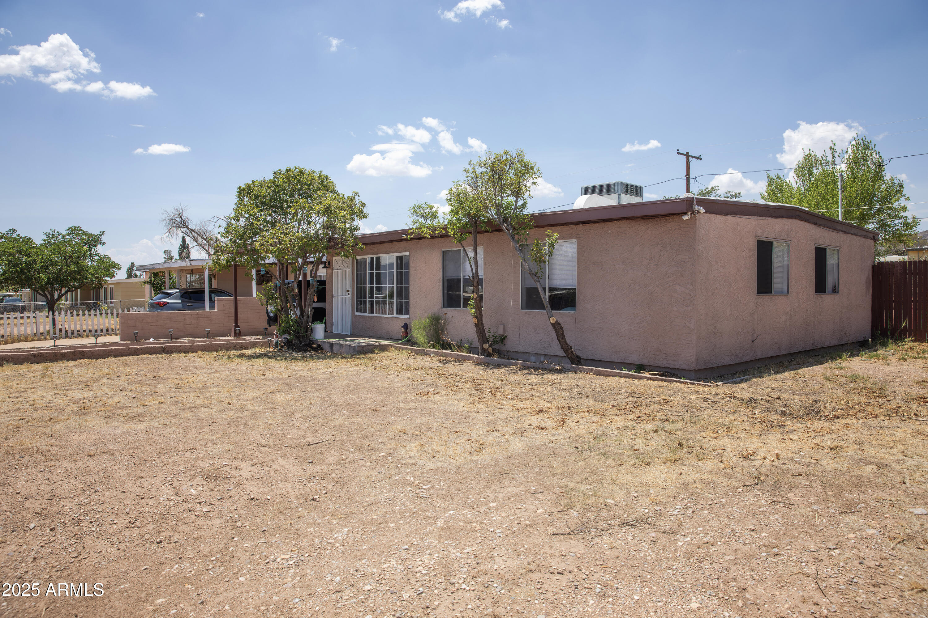 108 Graham Drive Bisbee, AZ 85603 - Photo 5 of 52 a view of a house with a yard