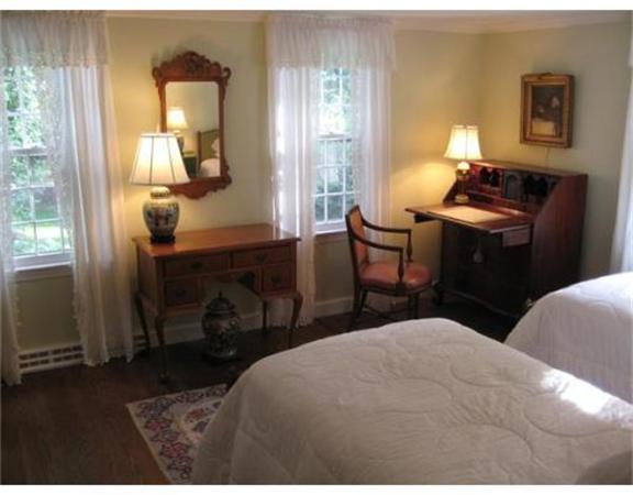 51 Grandview Road Chelmsford, MA 01824 - Photo 11 of 22 a bedroom with a bed and wooden floor