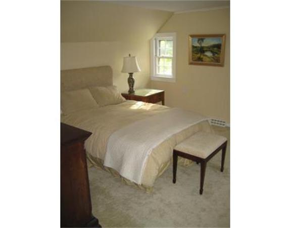 51 Grandview Road Chelmsford, MA 01824 - Photo 15 of 22 a bedroom with a bed and a window