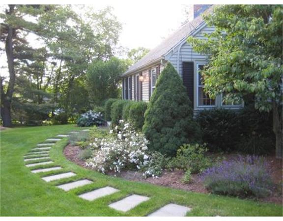 51 Grandview Road Chelmsford, MA 01824 - Photo 22 of 22 a front view of a house with garden