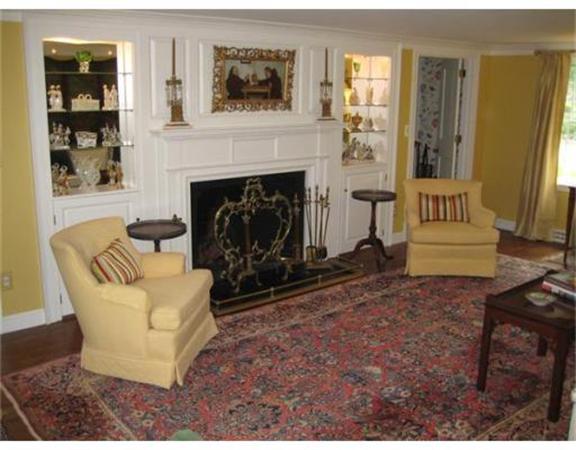 51 Grandview Road Chelmsford, MA 01824 - Photo 7 of 22 a living room with furniture and a fireplace