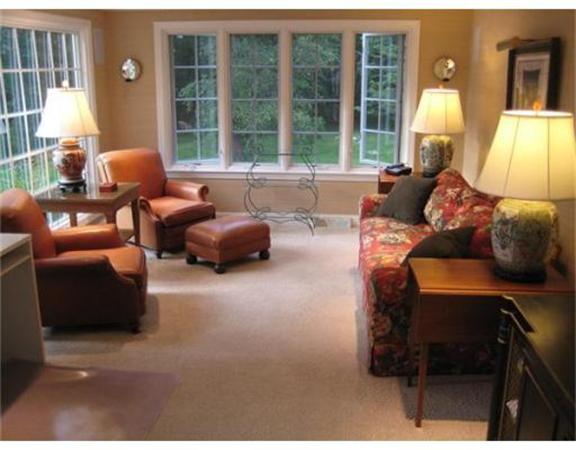 51 Grandview Road Chelmsford, MA 01824 - Photo 10 of 22 a living room with furniture and a lamp