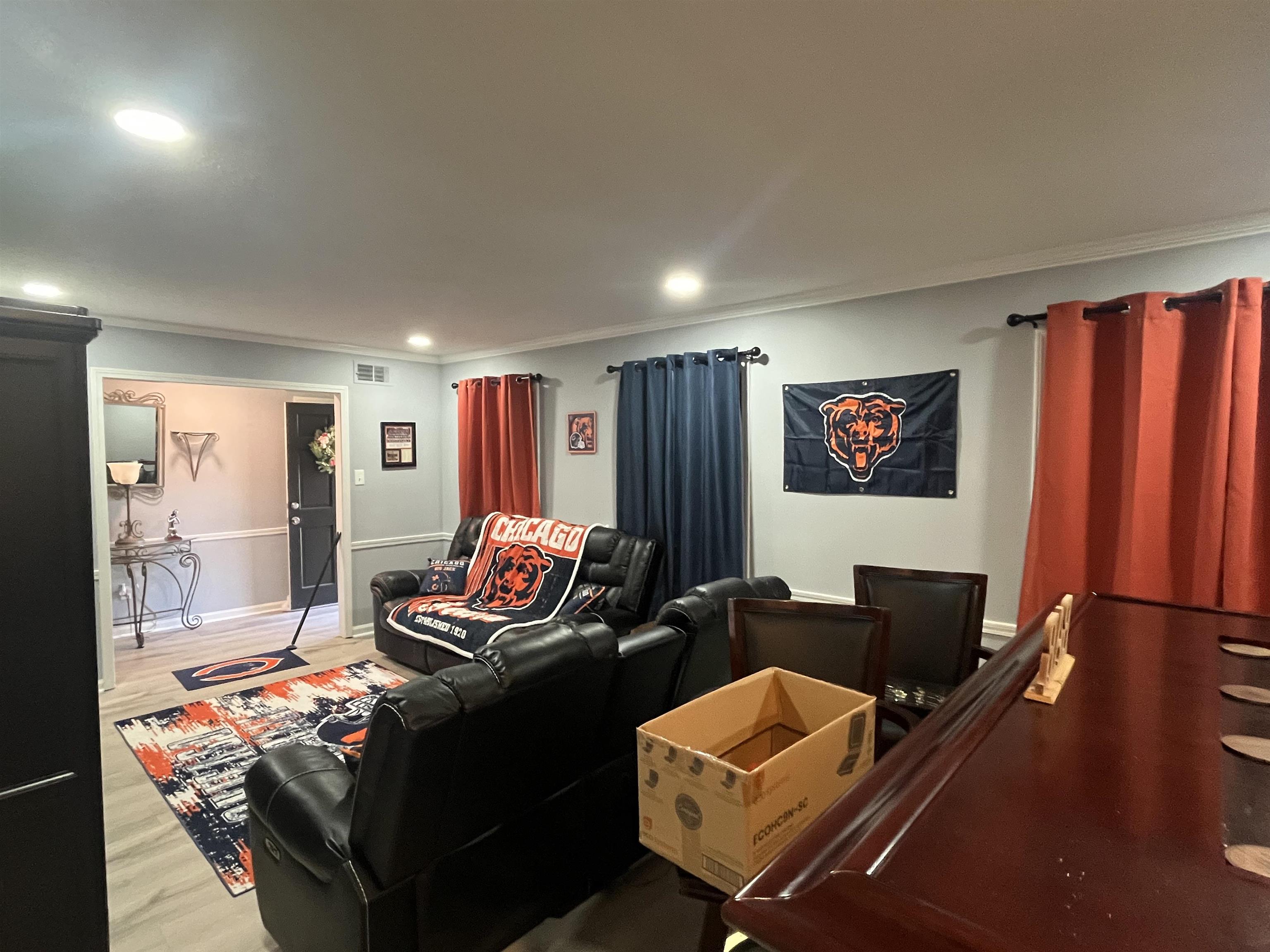3010 Falkirk Road Memphis, TN 38128 - Photo 4 of 13 Cinema room featuring wood finished floors, crown molding, and recessed lighting