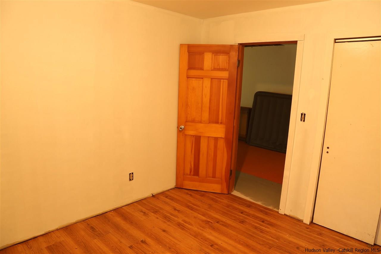 172 Bruceville Road High Falls, NY 12440 - Photo 6 of 10 a view of an empty room with wooden door